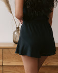 True Black ruffle drawstring shorts